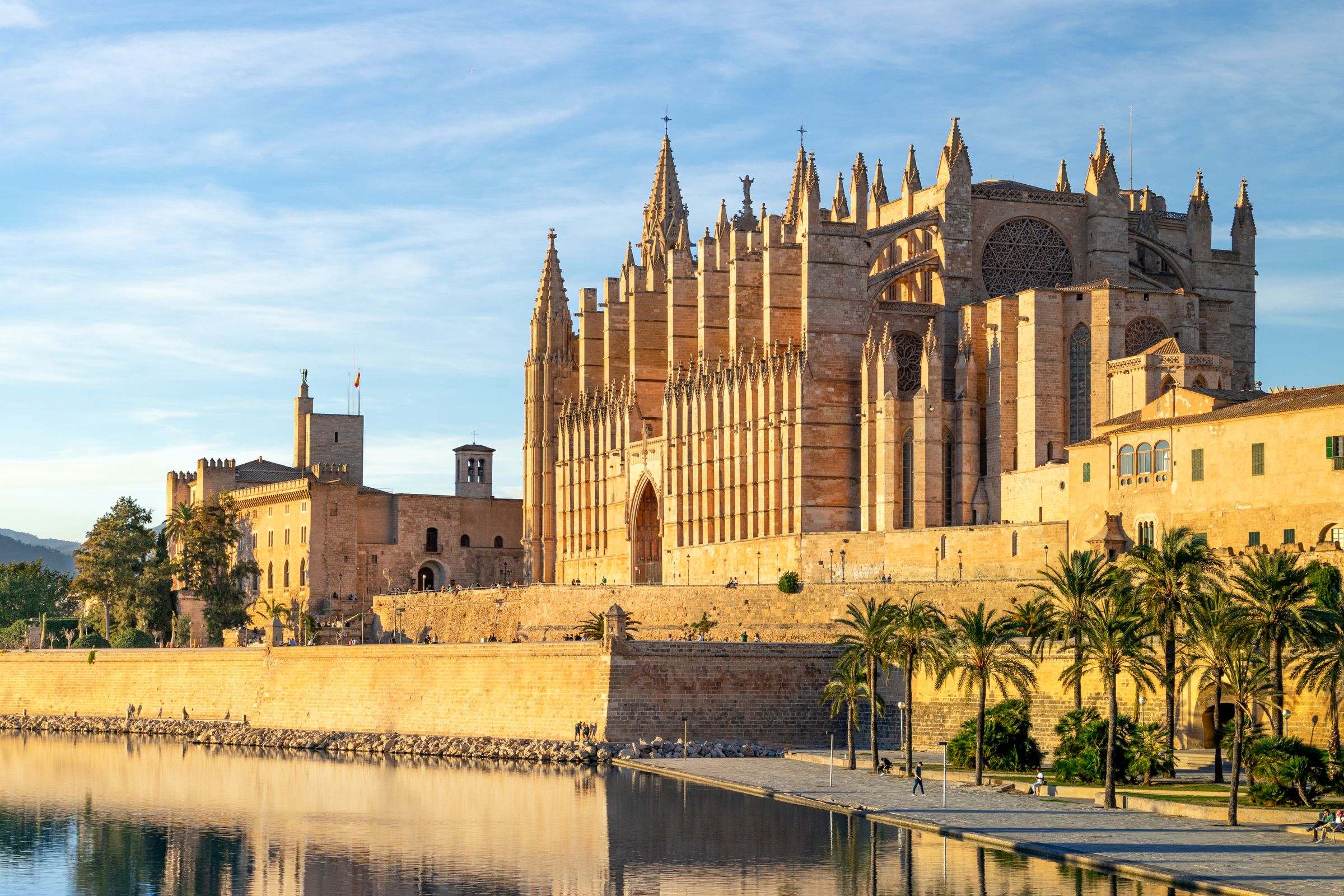 Palma cathedral La Seu in golden light above the Parc de la Mar